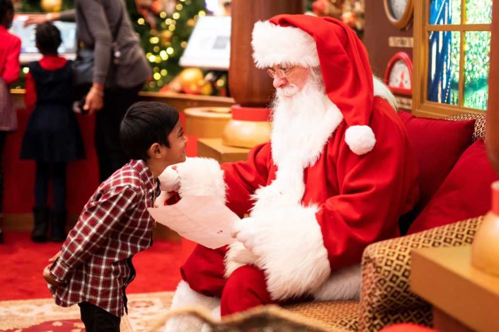 Santa talking to a boy